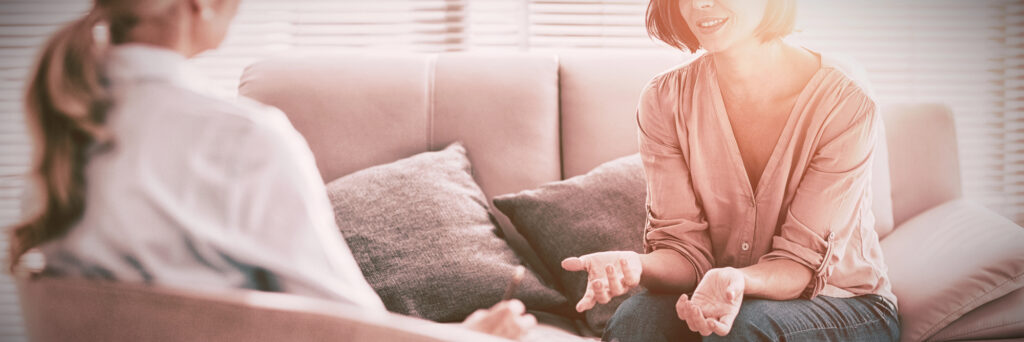 Psychotherapist providing counselling whilst being audio recorded for transcription